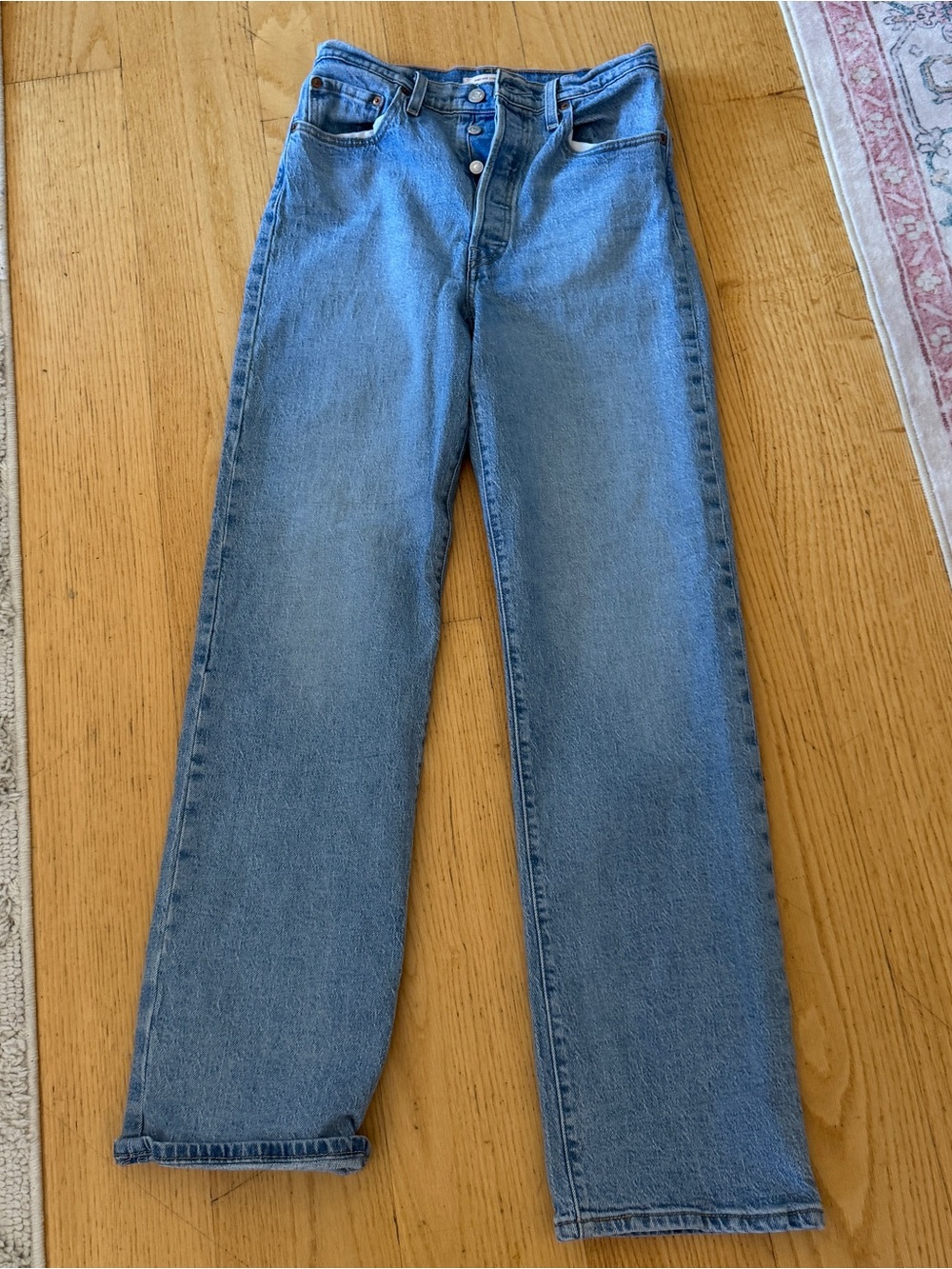 Levis High-Rise/ Ribcage Straight Leg Jeans in Light Wash